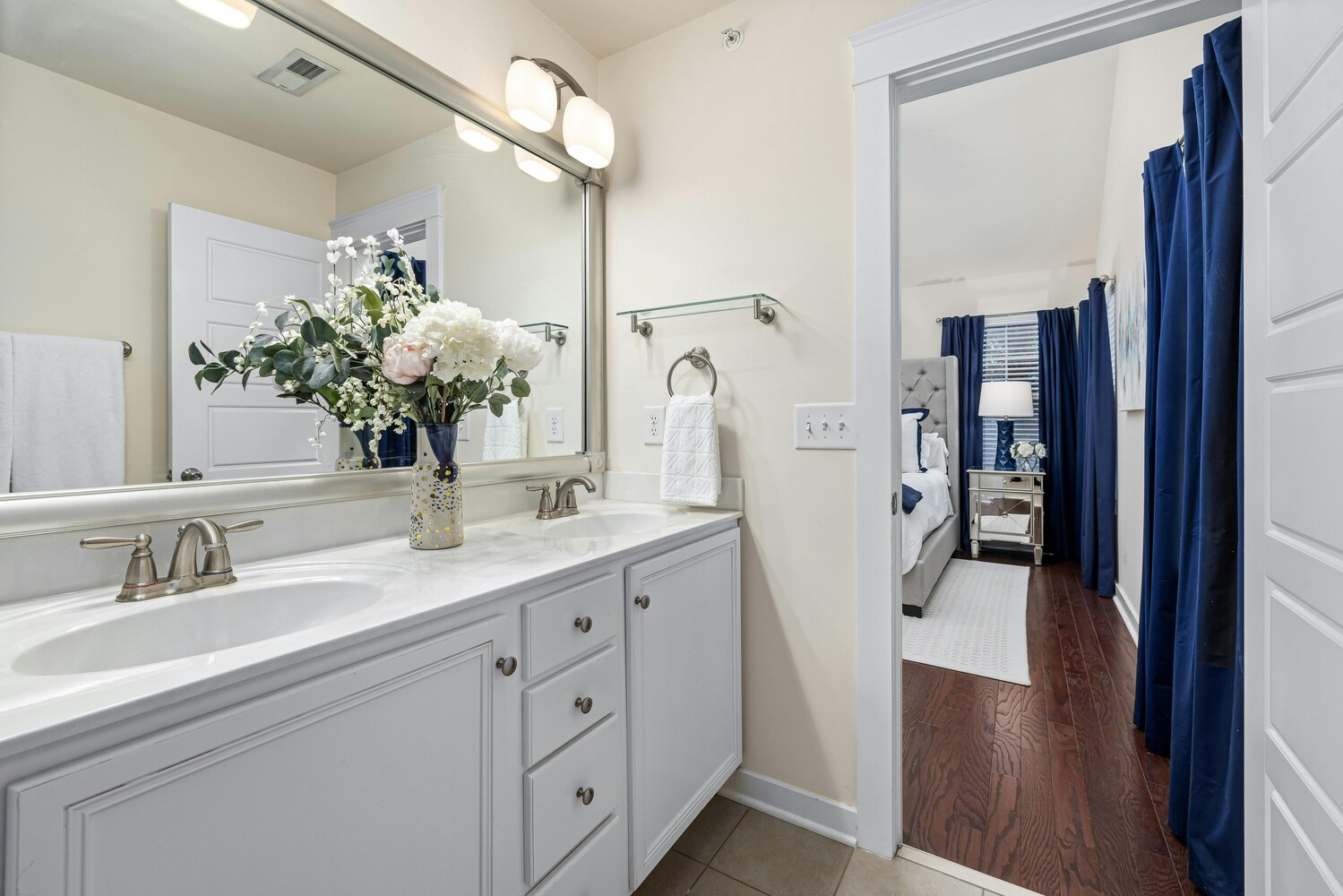Stock Photo of Bathroom vanity with fresh floral decor in a Bethel, Minnesota custom home. Stock Photo of Bathroom vanity with fresh floral decor in a Bethel, Minnesota custom home.