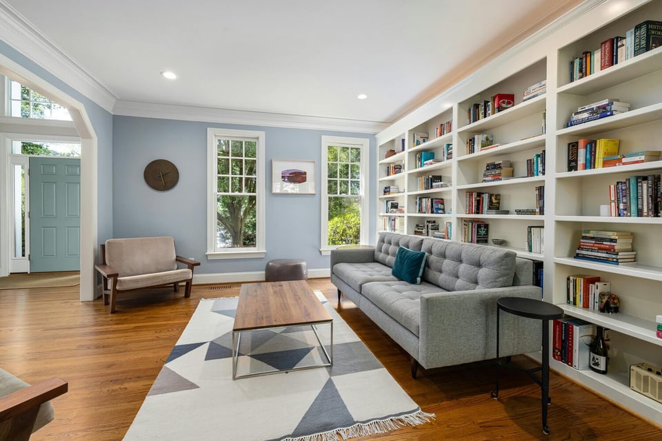 Stock Photo of Custom living room with built-in shelves and modern furniture in East Bethel, MN.