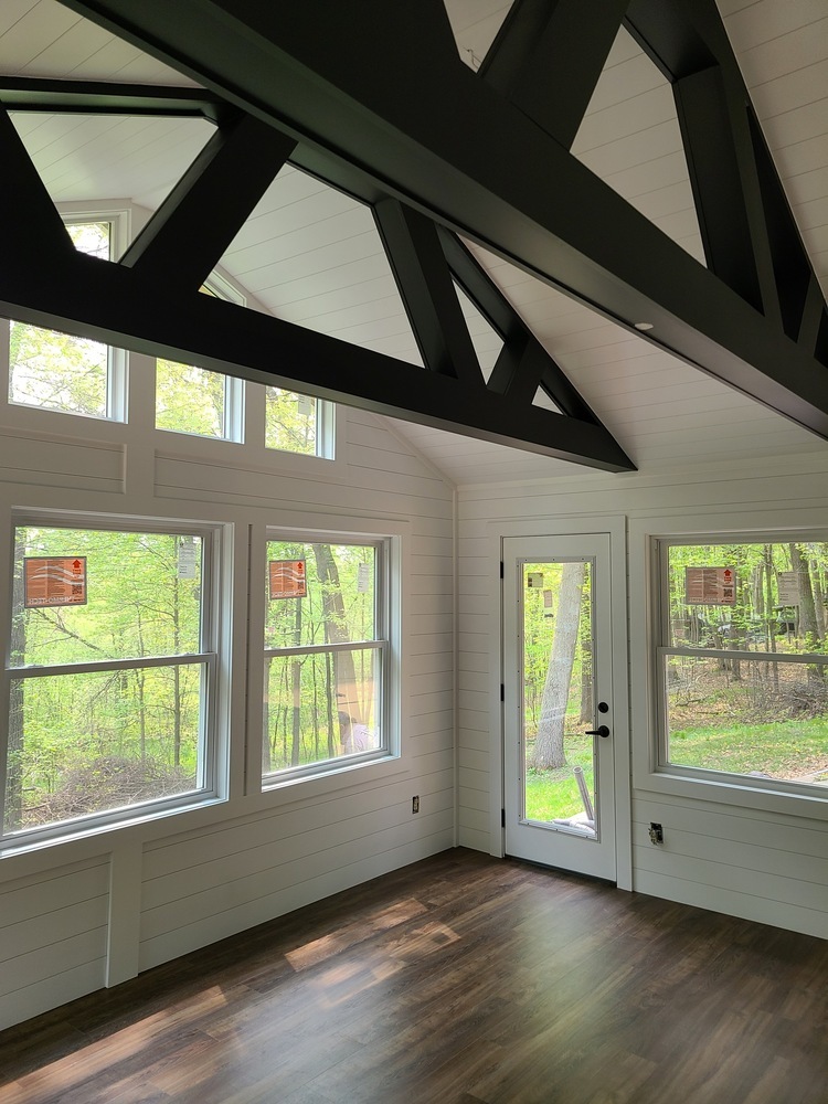 Vaulted ceiling and scenic windows in a new custom home in Ham Lake, MN by Willet Remodeling and Construction.